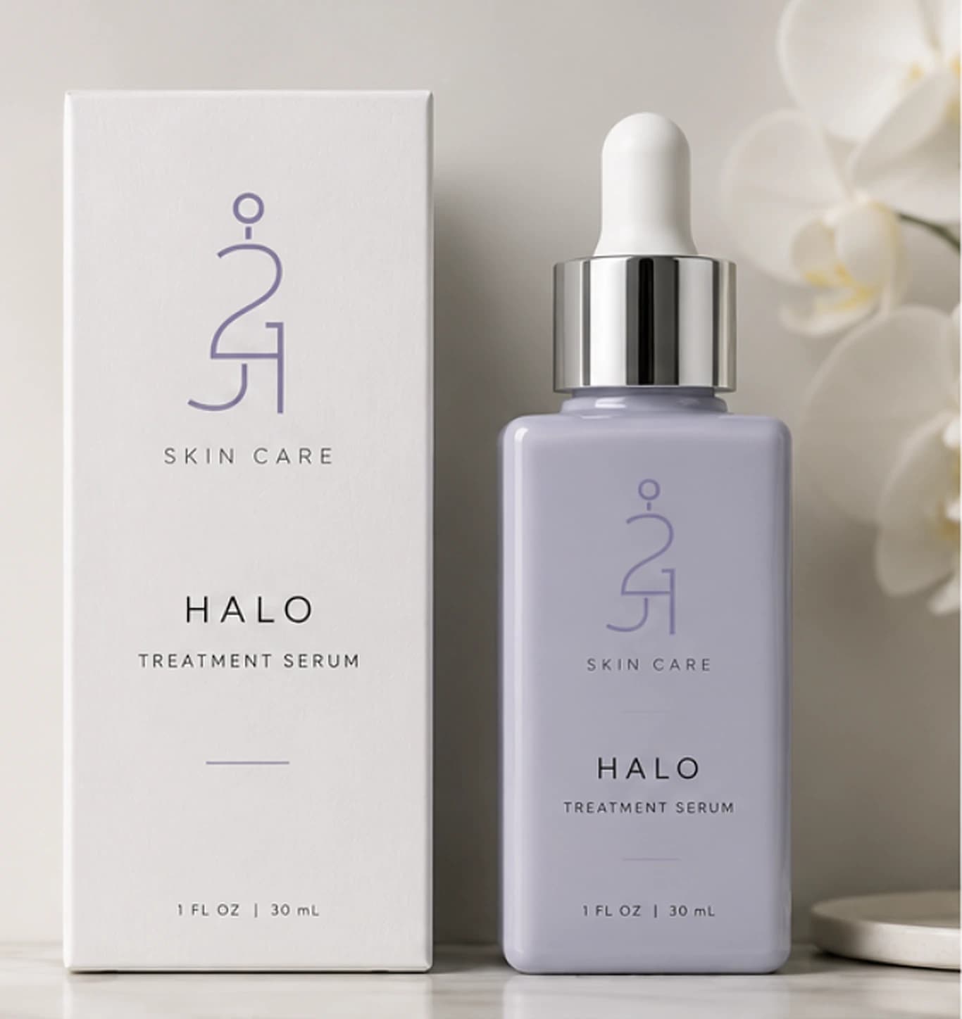 The HALO Treatment Serum bottle beside its carton, in J21 Signature Lavender.